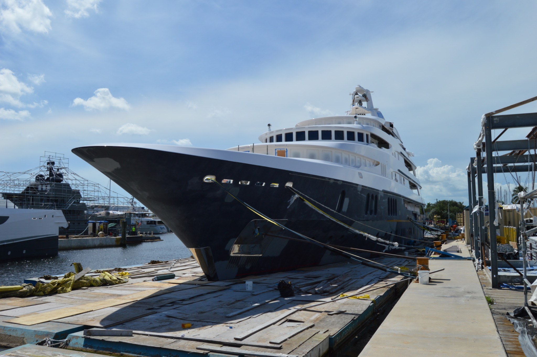 Large motor yacht positioned ashore during a major shipyard period